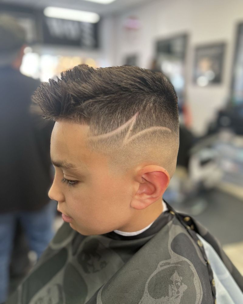 Kid's spiked textured top with fade and curved line design