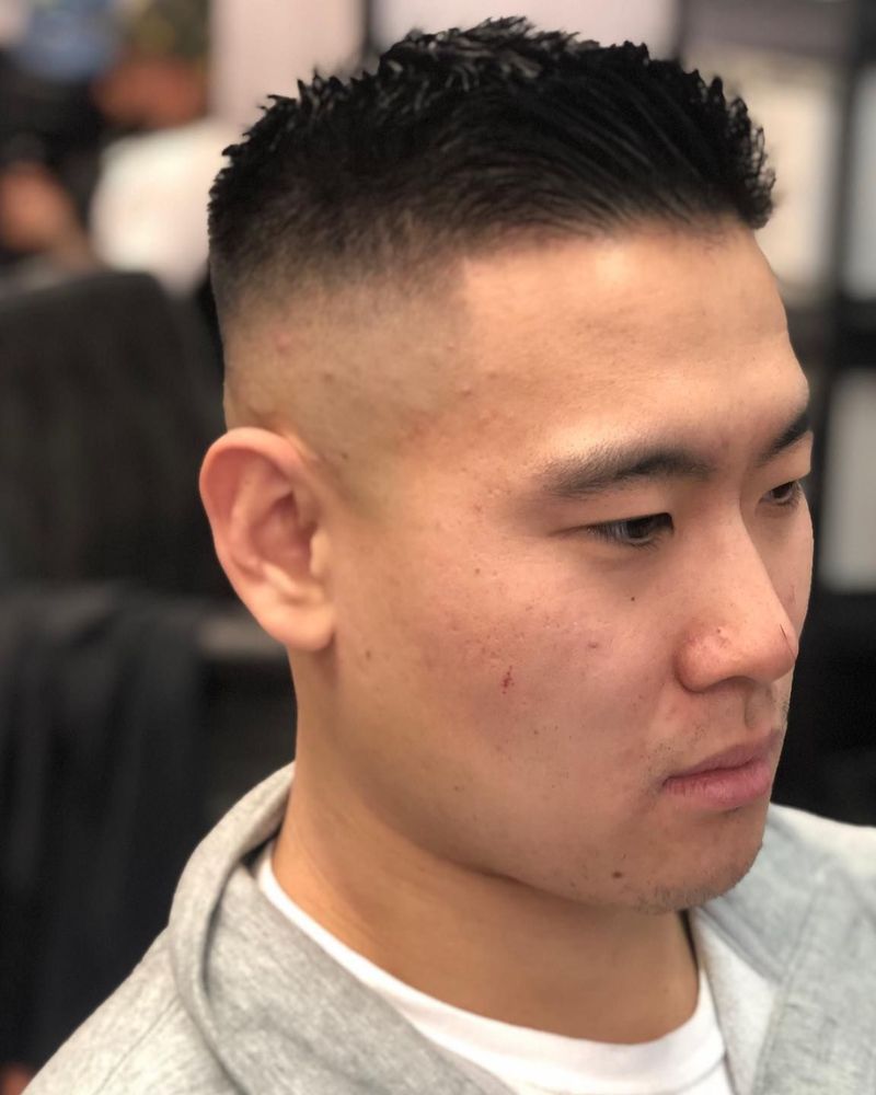 Short textured crop with clean skin fade